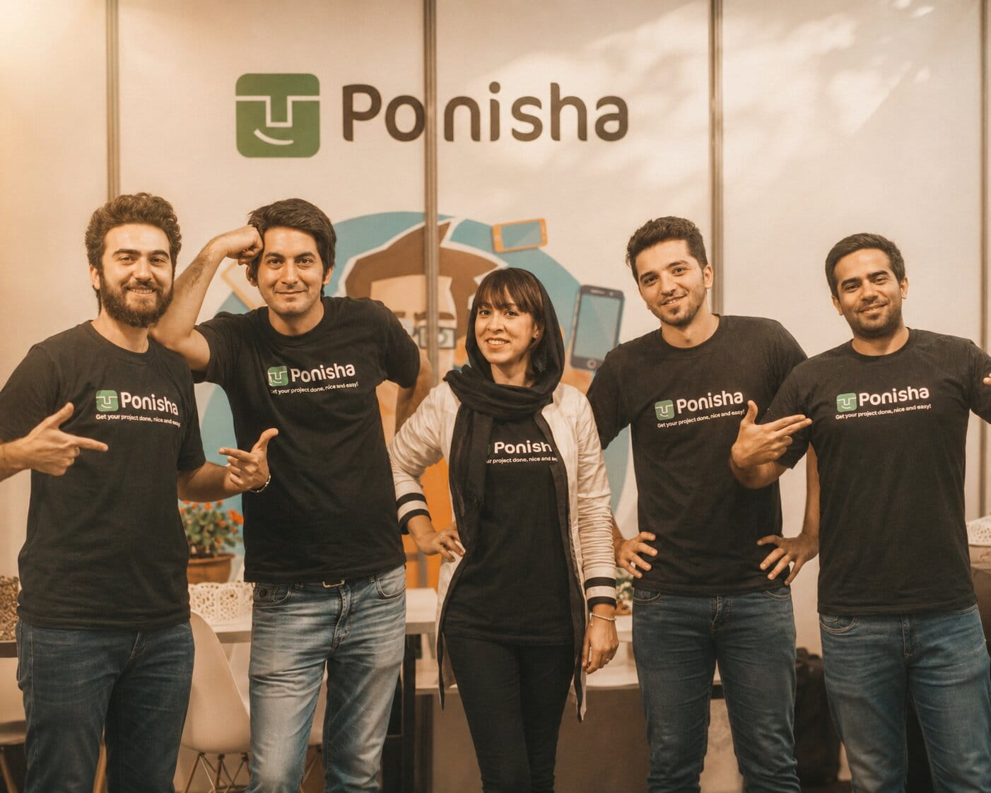 Roza with her team